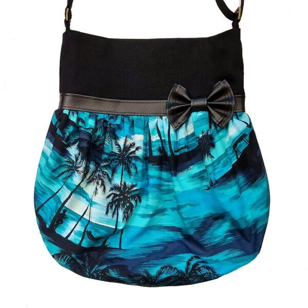 sac à bandoulière avec boucle en cuirette motif de plage et palmiers couleur turquoise